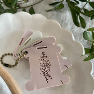 Set of Bobbins with a Floral Design