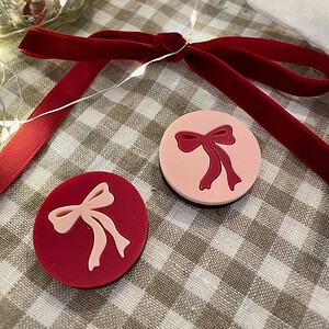 Bow Needle Minder