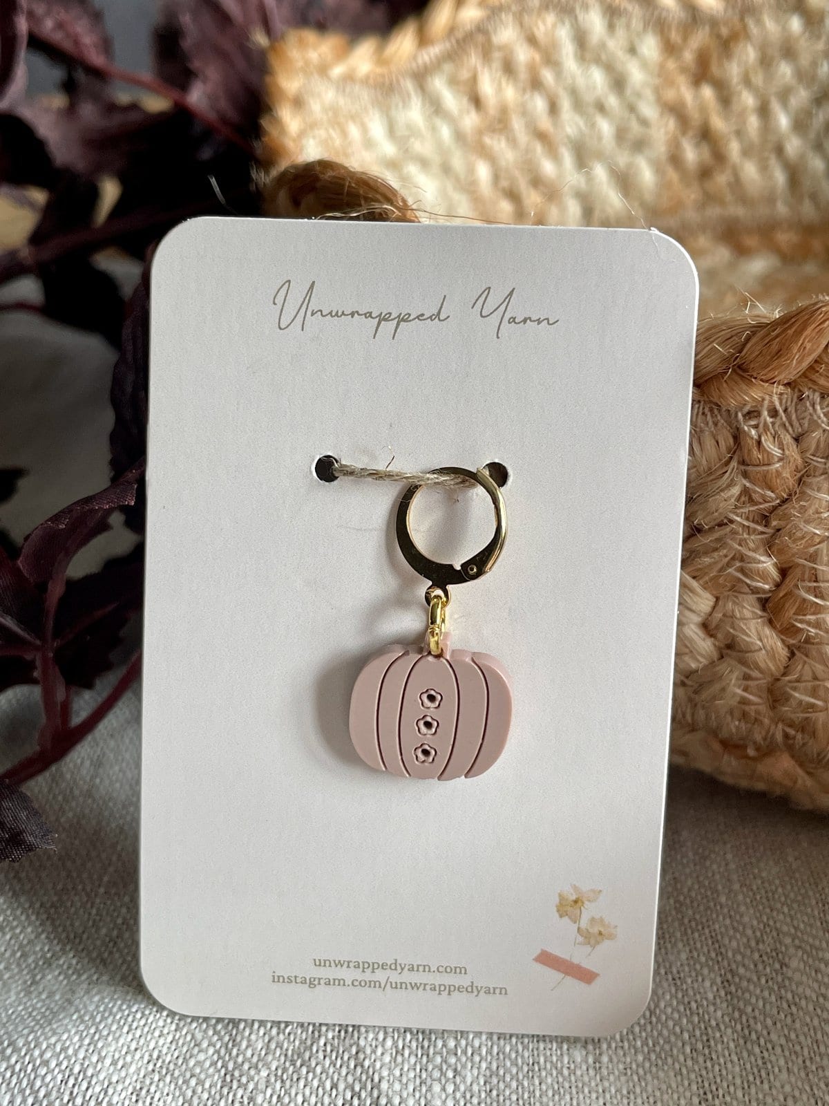 Deluxe pumpkin-shaped silicone charm with keyring for yarn or craft accessories, designed for creative crafters.