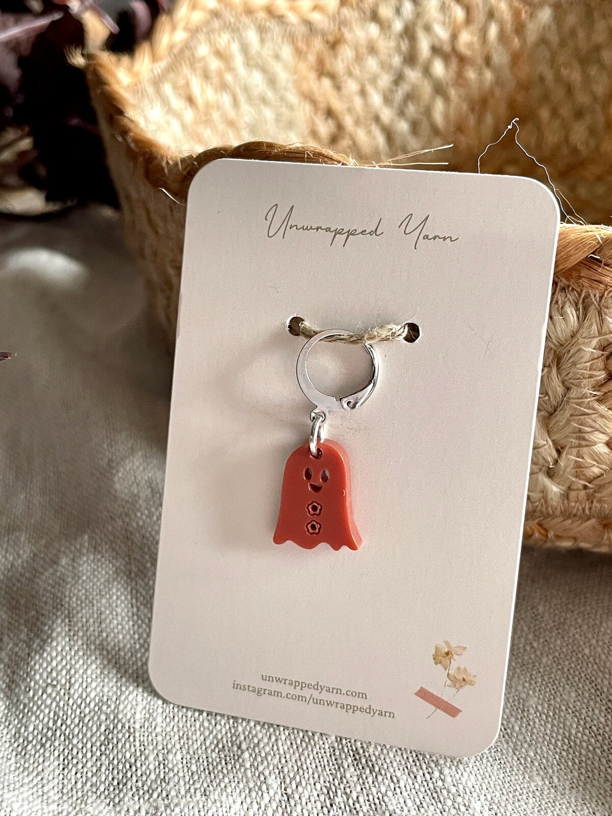 Mini ghost charm with a smiley face on a silver keyring, perfect for Halloween or spooky-themed accessories.
