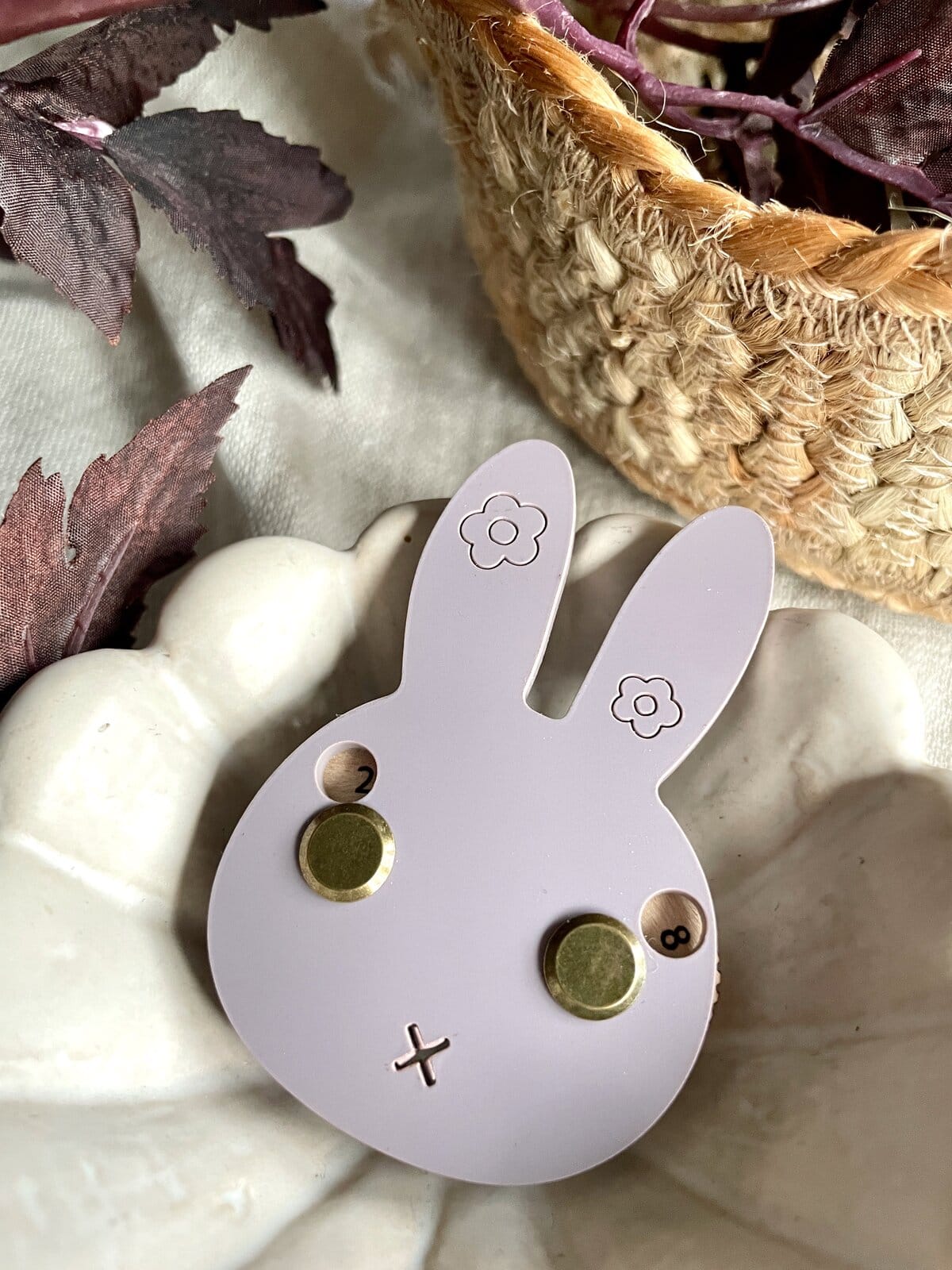 Cute bunny-shaped magnetic note holder with flowers on ears, ideal for organizing or decorating your craft space.