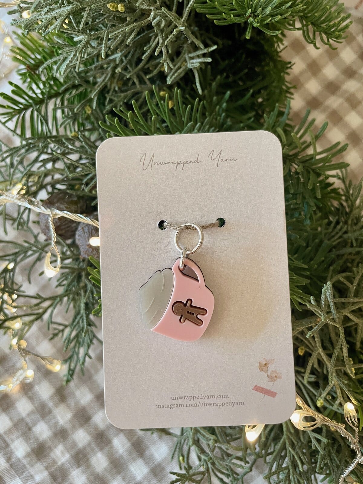 Cute handmade gift idea, gingerbread man charm on pink and transparent acrylic pendant, perfect for holiday cheer.