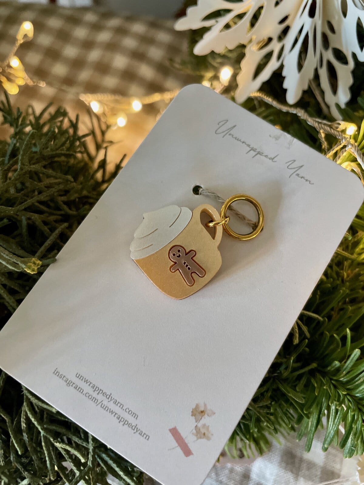 Coffee cup holiday ornament with gingerbread cookie charm on white background, holiday decor, Christmas ornament, gift idea.